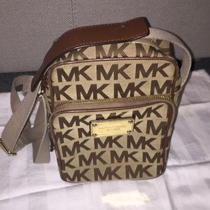 Authentic Michael Kors signature flight Crossbody.